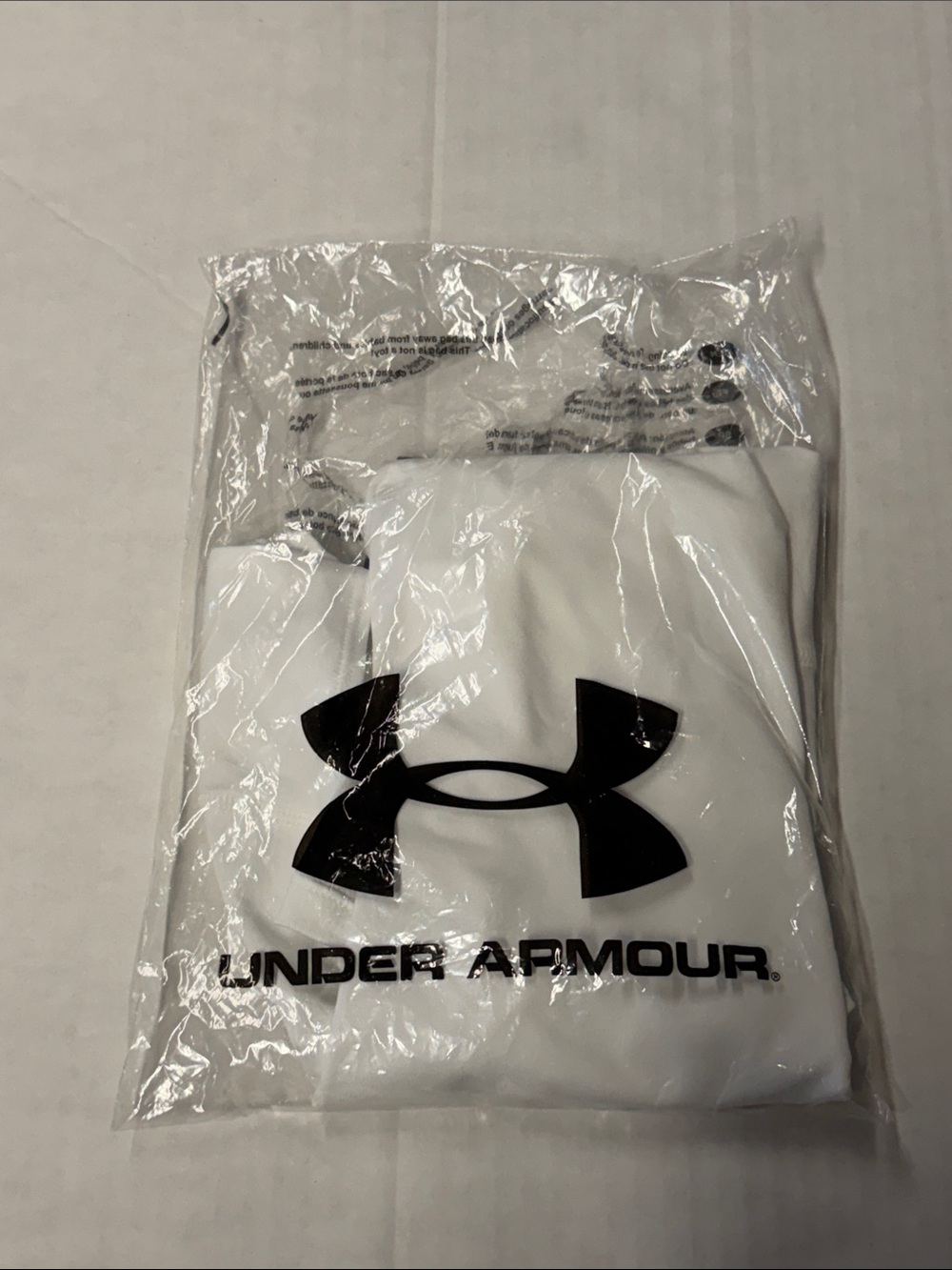 Under Armour White compression shirt with Black Logo men’s size small